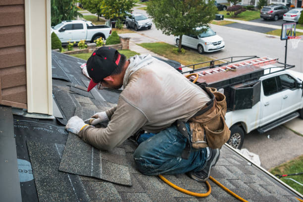 Professional Roofing technician working in Reedsville, WI